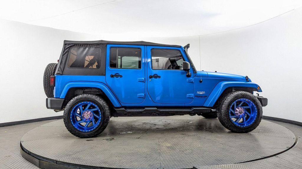 used 2015 Jeep Wrangler Unlimited car, priced at $16,897