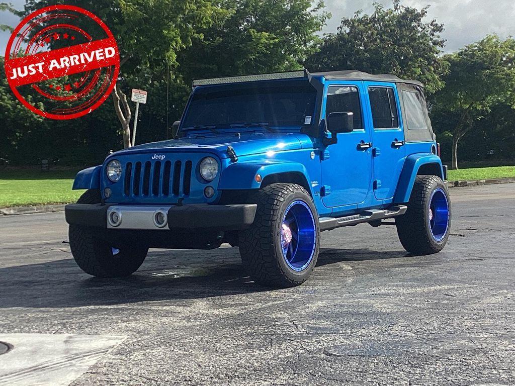 used 2015 Jeep Wrangler Unlimited car, priced at $17,499