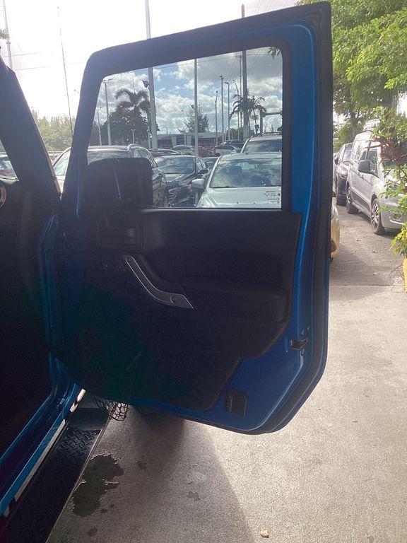 used 2015 Jeep Wrangler Unlimited car, priced at $17,499