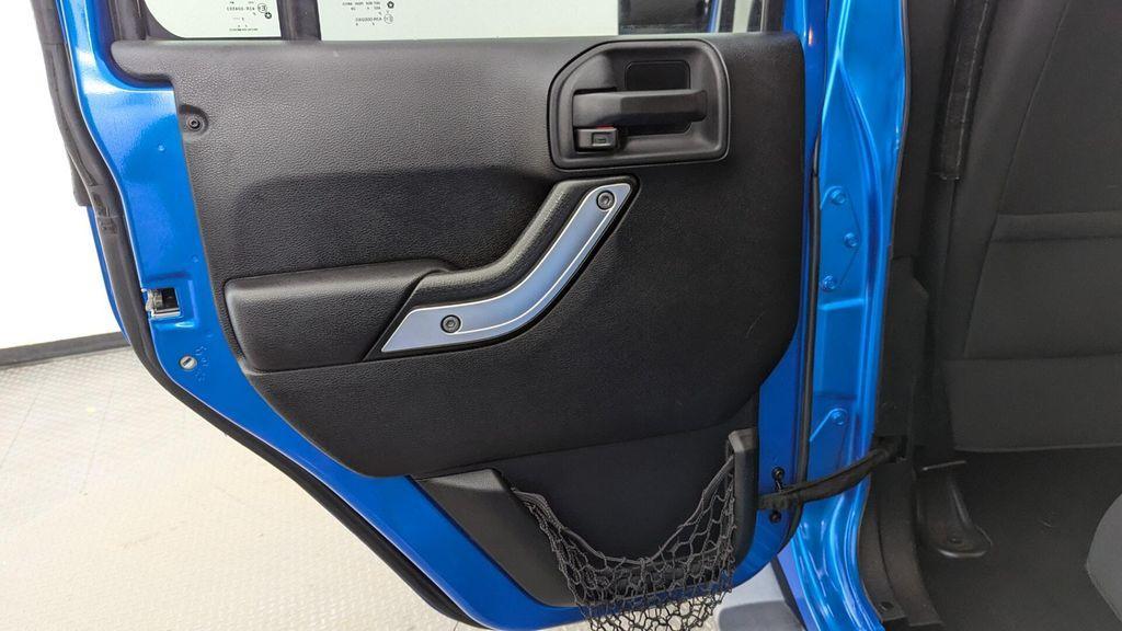 used 2015 Jeep Wrangler Unlimited car, priced at $16,897