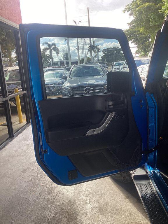 used 2015 Jeep Wrangler Unlimited car, priced at $17,499