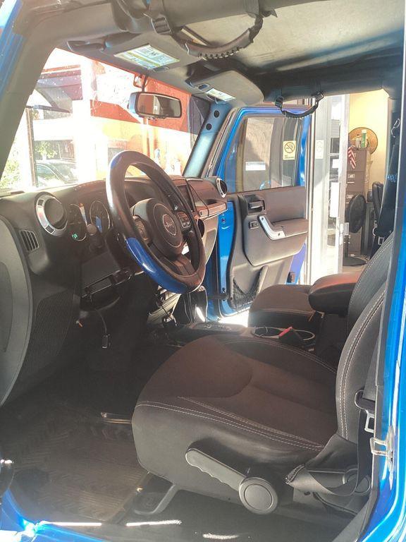 used 2015 Jeep Wrangler Unlimited car, priced at $17,499