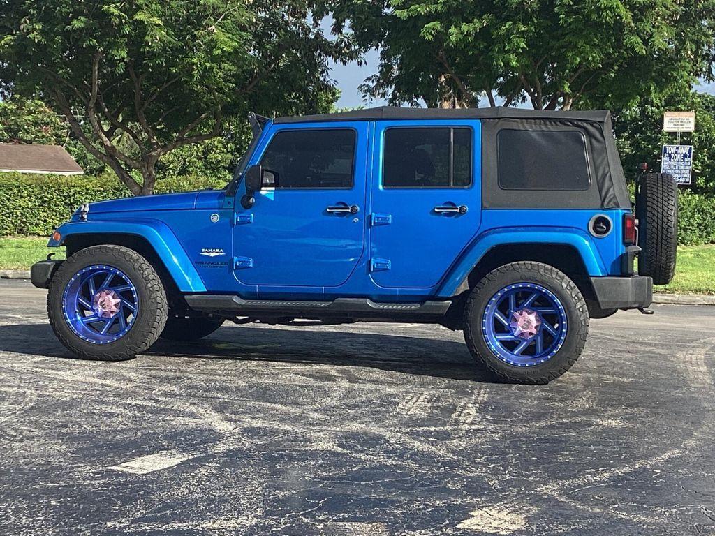 used 2015 Jeep Wrangler Unlimited car, priced at $17,499