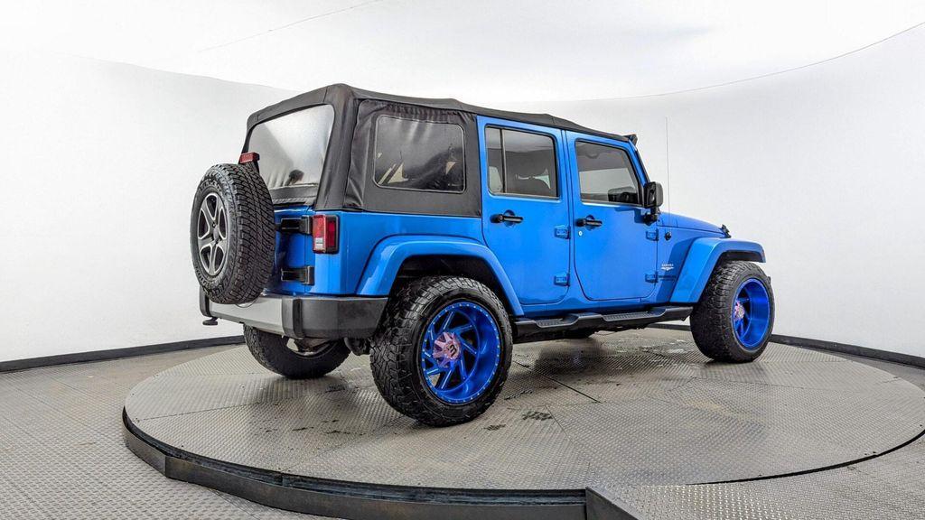 used 2015 Jeep Wrangler Unlimited car, priced at $16,897