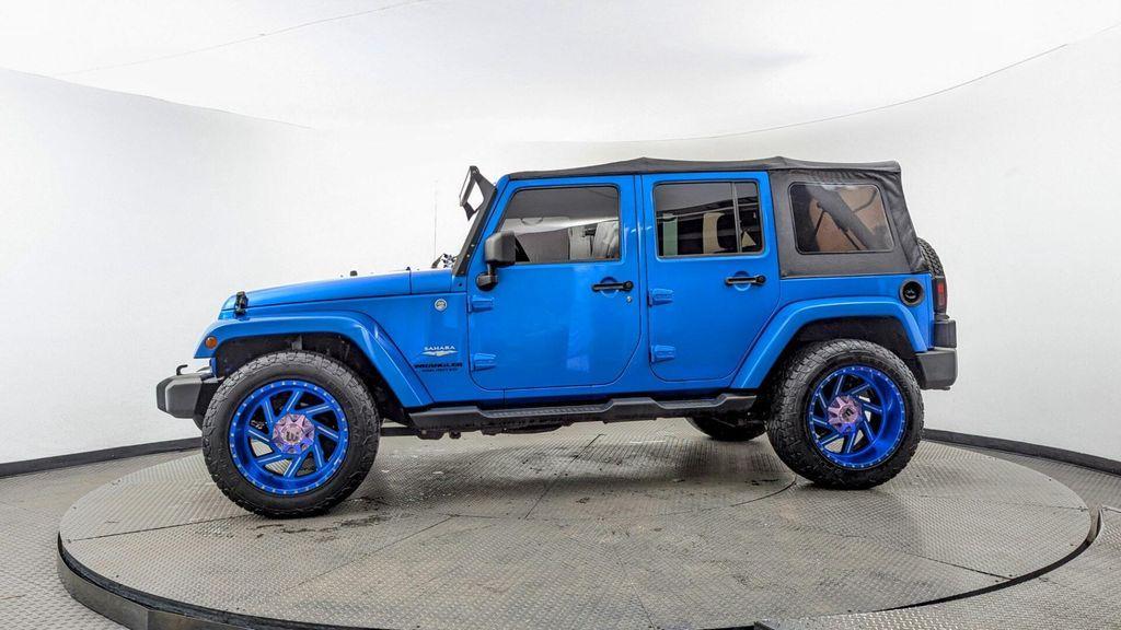 used 2015 Jeep Wrangler Unlimited car, priced at $16,897