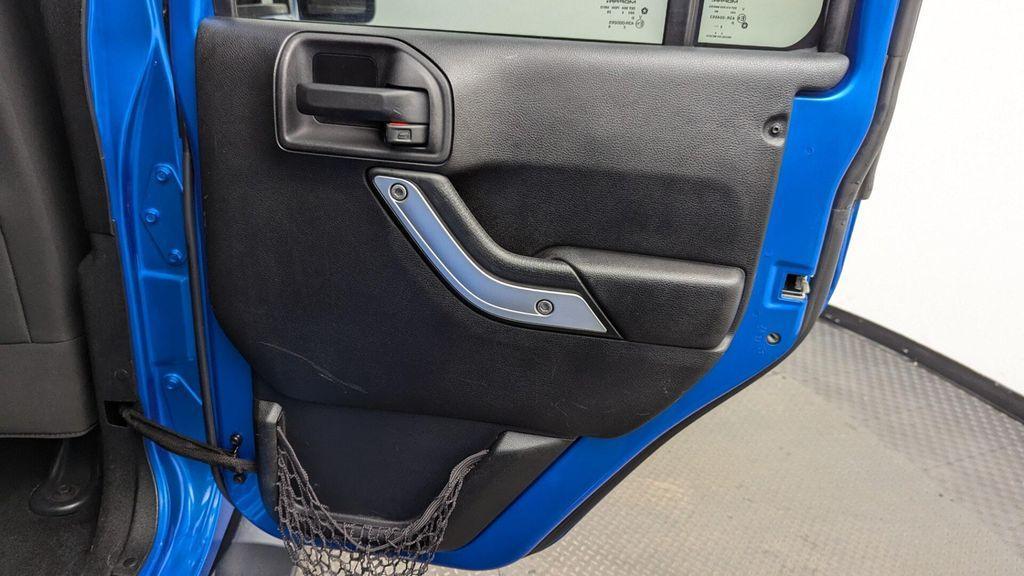 used 2015 Jeep Wrangler Unlimited car, priced at $16,897