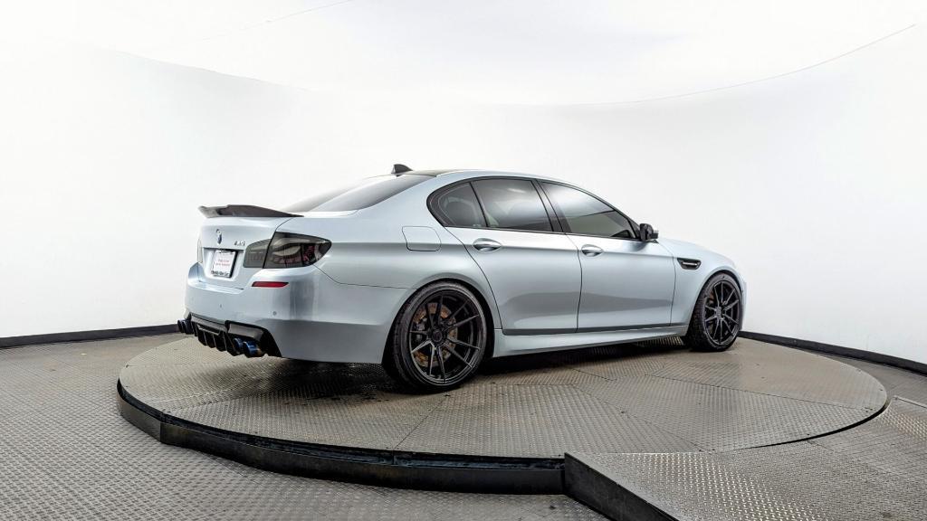 used 2015 BMW M5 car, priced at $23,499