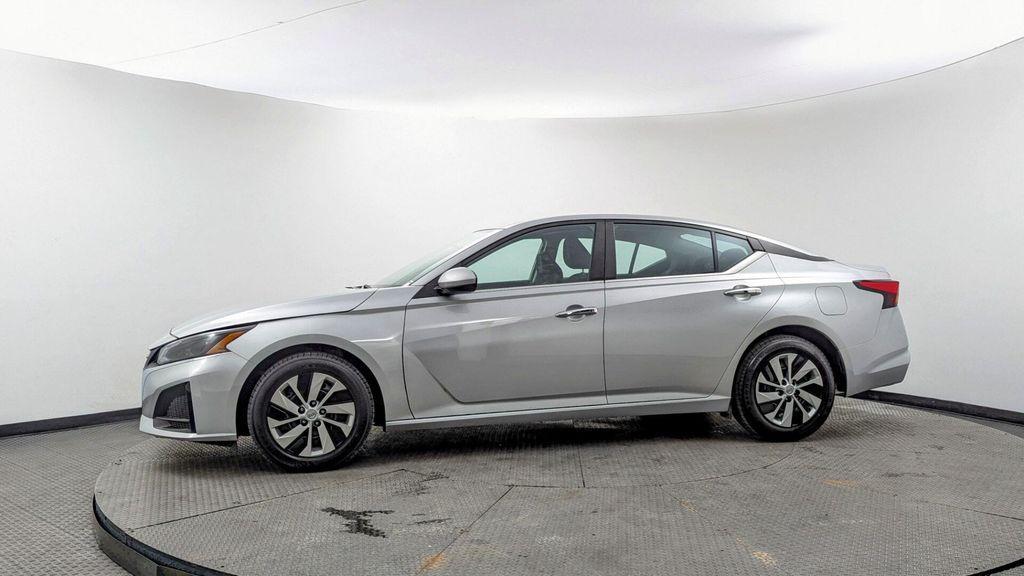 used 2023 Nissan Altima car, priced at $14,999