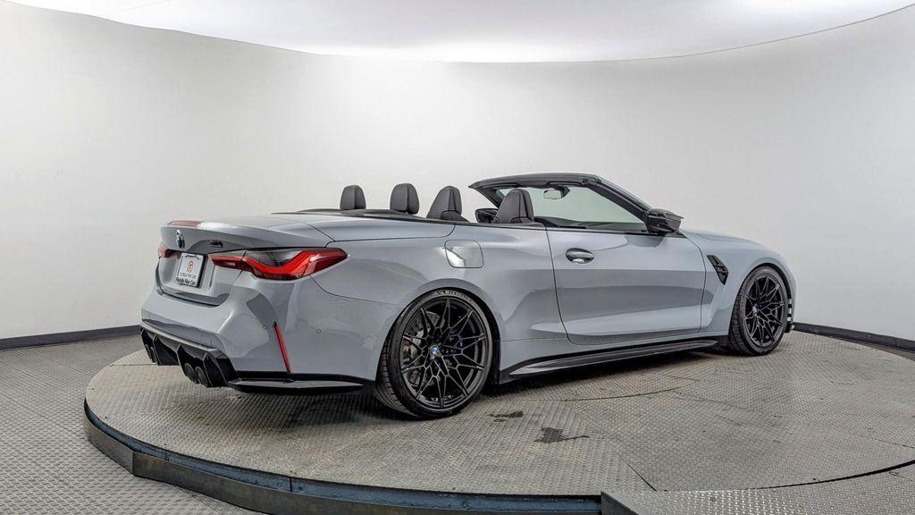 used 2022 BMW M4 car, priced at $64,899