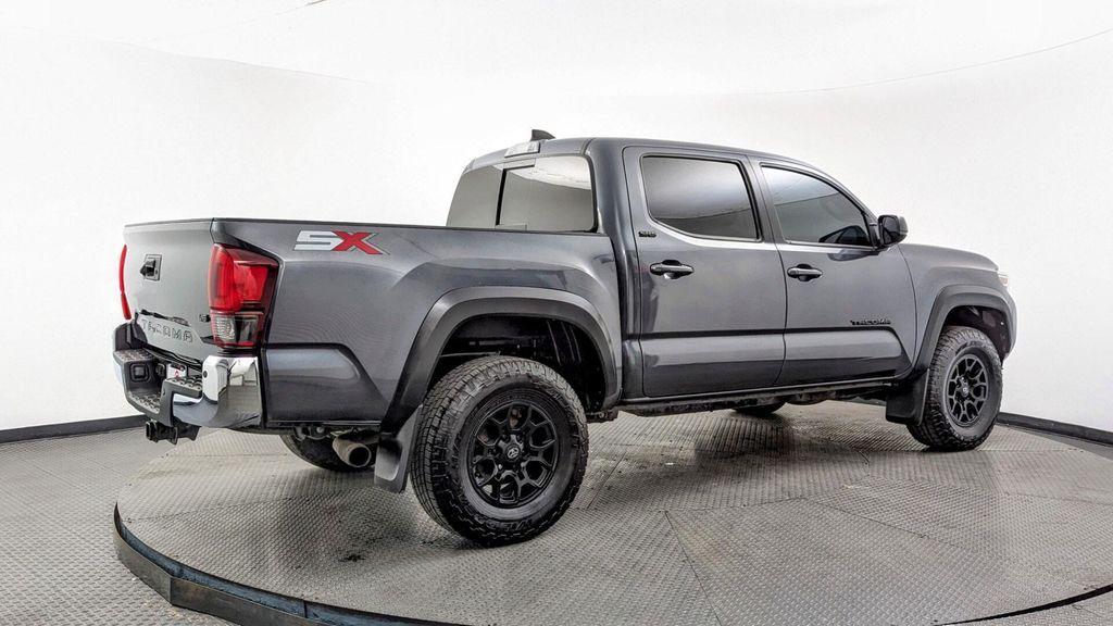 used 2023 Toyota Tacoma car, priced at $26,499