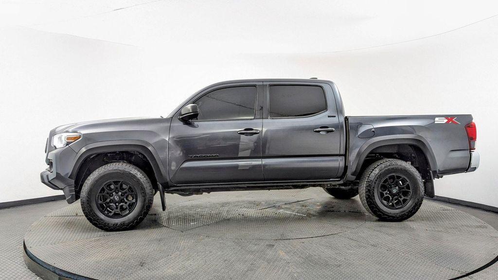 used 2023 Toyota Tacoma car, priced at $26,499