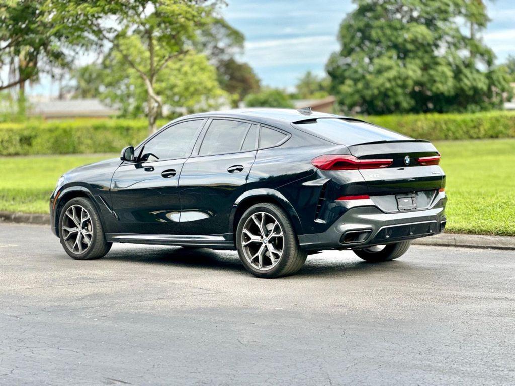 used 2022 BMW X6 car, priced at $51,499