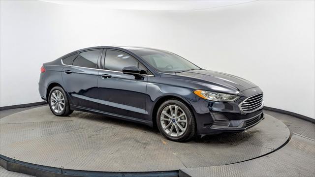 used 2020 Ford Fusion Hybrid car, priced at $12,499