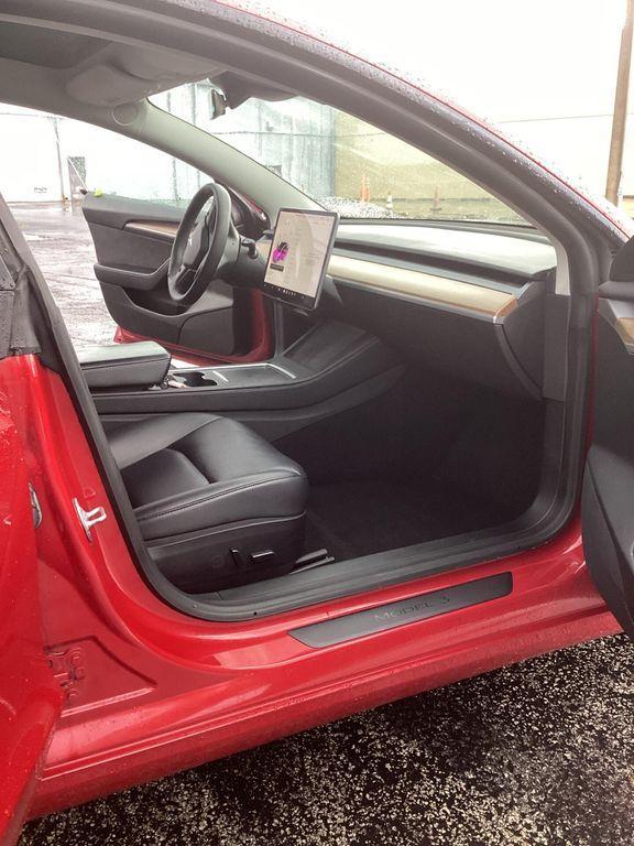 used 2022 Tesla Model 3 car, priced at $17,999