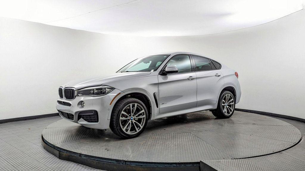 used 2019 BMW X6 car, priced at $23,898