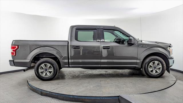 used 2018 Ford F-150 car, priced at $23,299