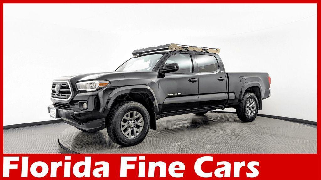 used 2018 Toyota Tacoma car, priced at $23,499