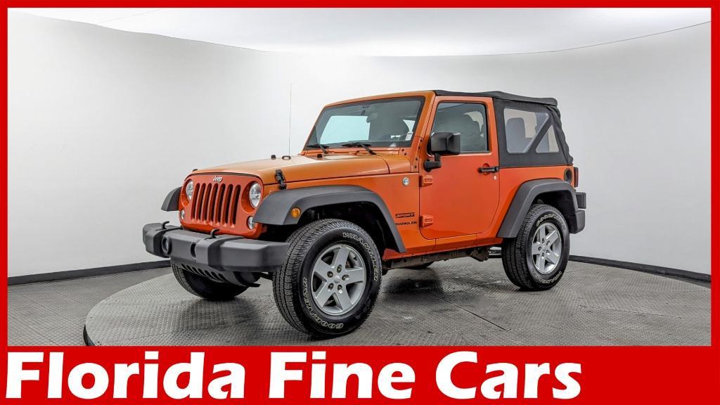 used 2015 Jeep Wrangler car, priced at $14,099