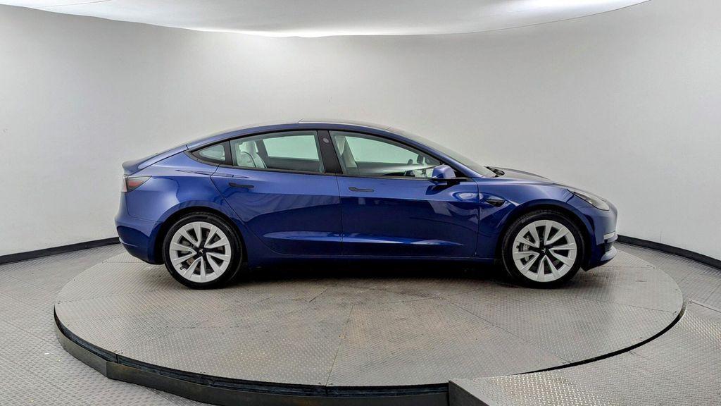 used 2023 Tesla Model 3 car, priced at $24,399