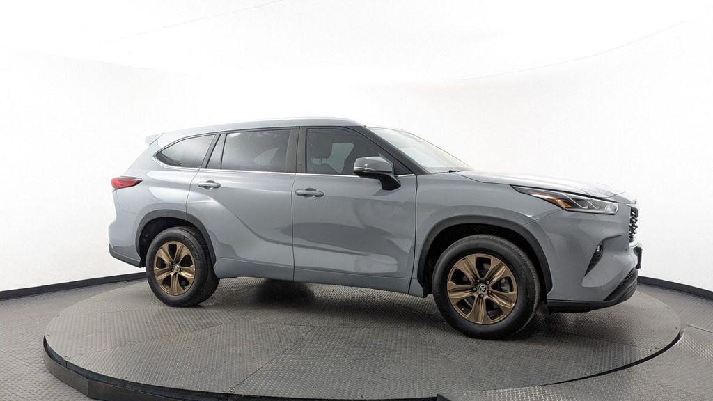 used 2023 Toyota Highlander Hybrid car, priced at $28,799