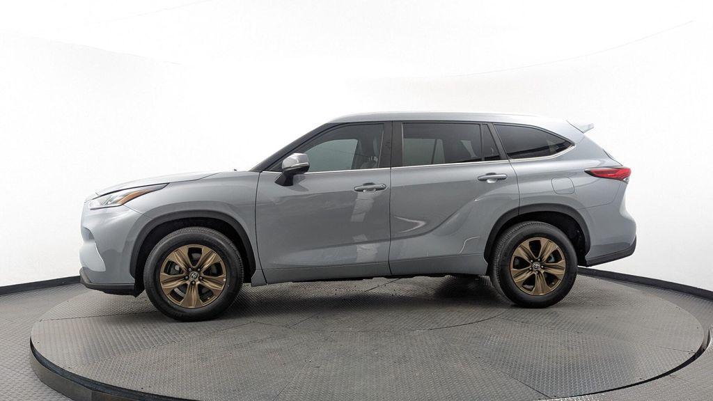 used 2023 Toyota Highlander Hybrid car, priced at $28,799
