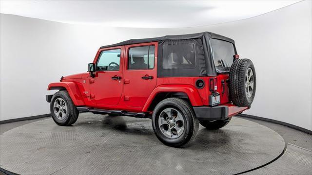 used 2018 Jeep Wrangler JK Unlimited car, priced at $20,299