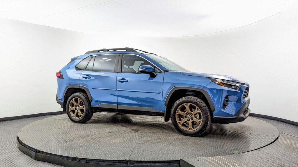 used 2023 Toyota RAV4 Hybrid car, priced at $23,499