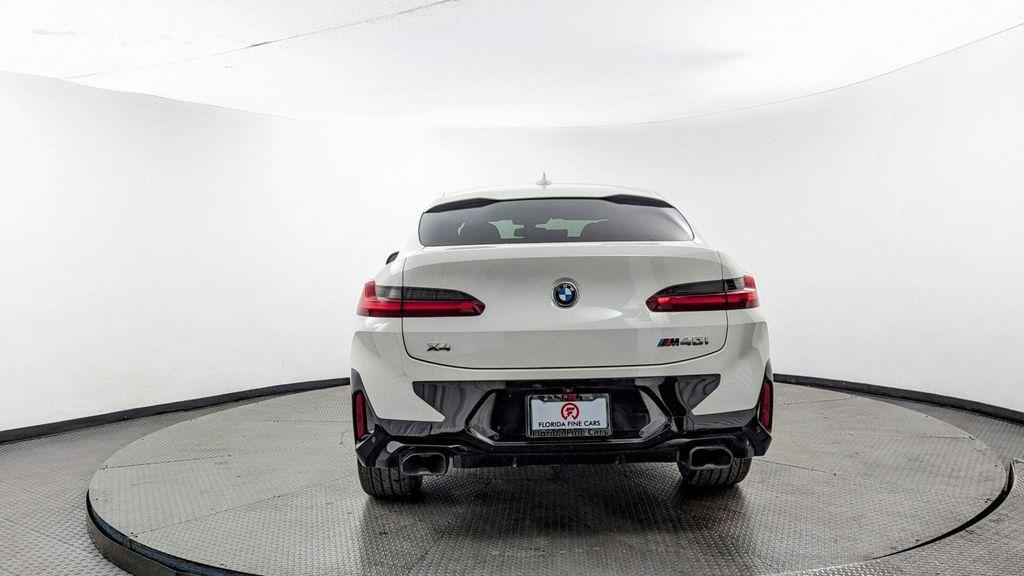 used 2022 BMW X4 car, priced at $35,299
