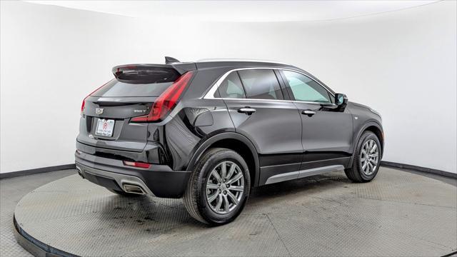 used 2023 Cadillac XT4 car, priced at $24,494