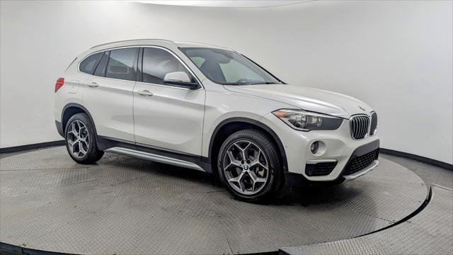used 2018 BMW X1 car, priced at $15,899