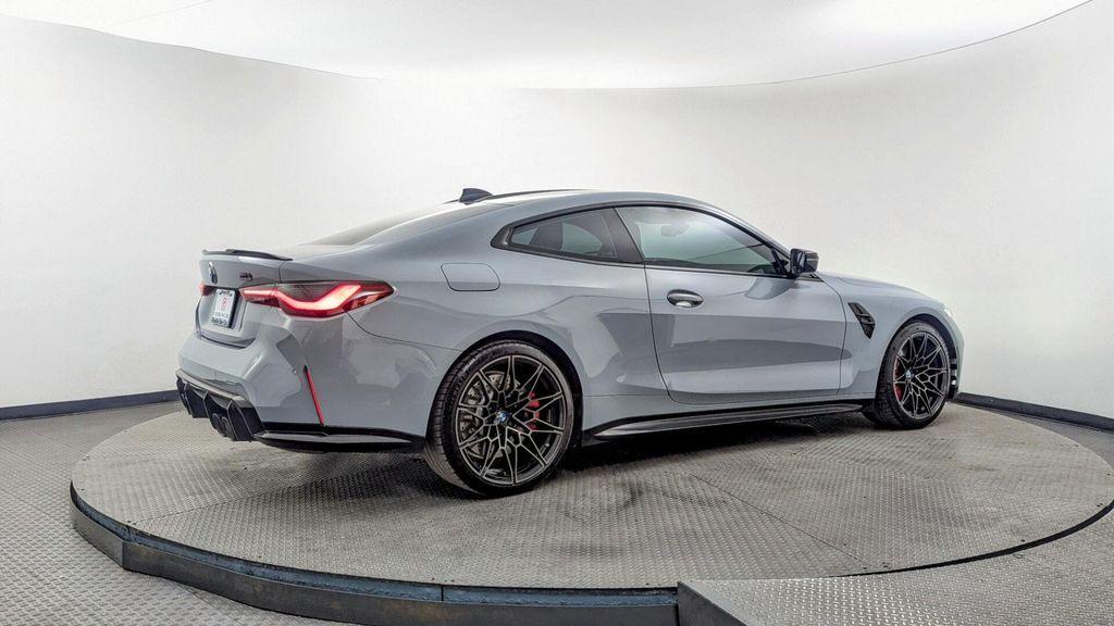 used 2022 BMW M4 car, priced at $63,999