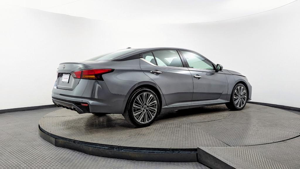 used 2023 Nissan Altima car, priced at $14,999