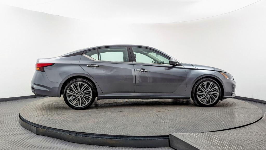 used 2023 Nissan Altima car, priced at $14,999