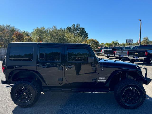 used 2012 Jeep Wrangler Unlimited car, priced at $11,995