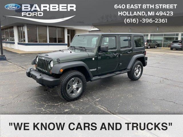 used 2011 Jeep Wrangler Unlimited car, priced at $15,880