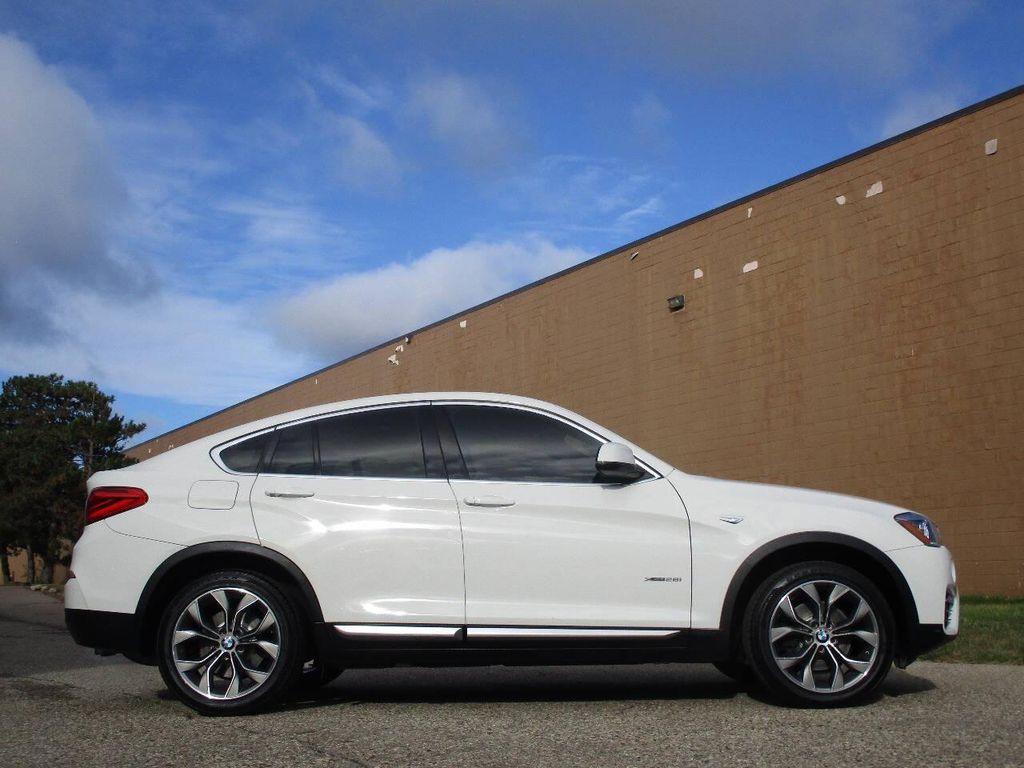 used 2018 BMW X4 car, priced at $24,687