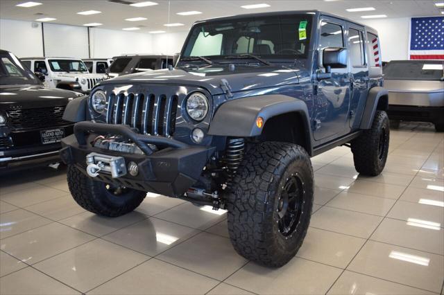 used 2016 Jeep Wrangler Unlimited car, priced at $27,377