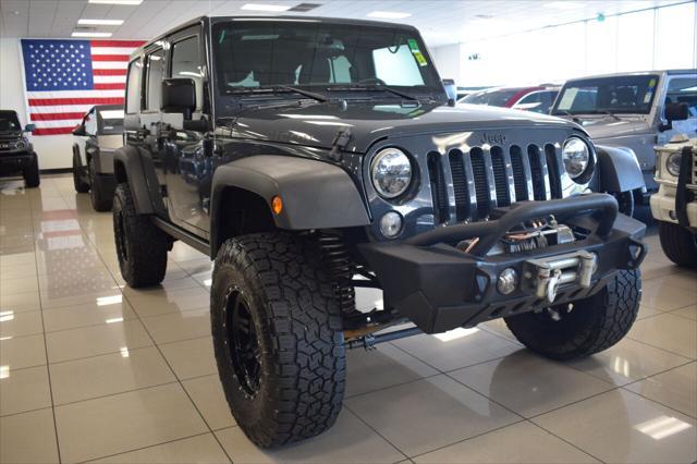 used 2016 Jeep Wrangler Unlimited car, priced at $27,377