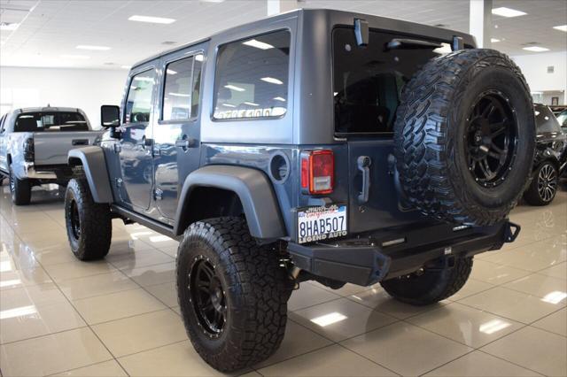 used 2016 Jeep Wrangler Unlimited car, priced at $27,377