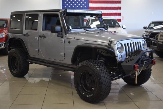 used 2014 Jeep Wrangler Unlimited car, priced at $20,777