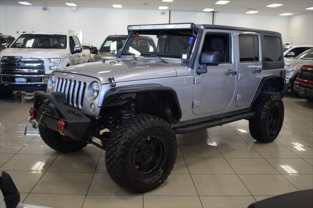 used 2014 Jeep Wrangler Unlimited car, priced at $20,777