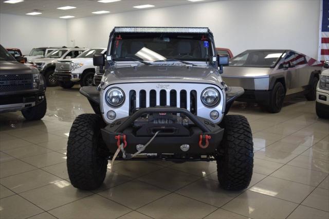 used 2014 Jeep Wrangler Unlimited car, priced at $20,777