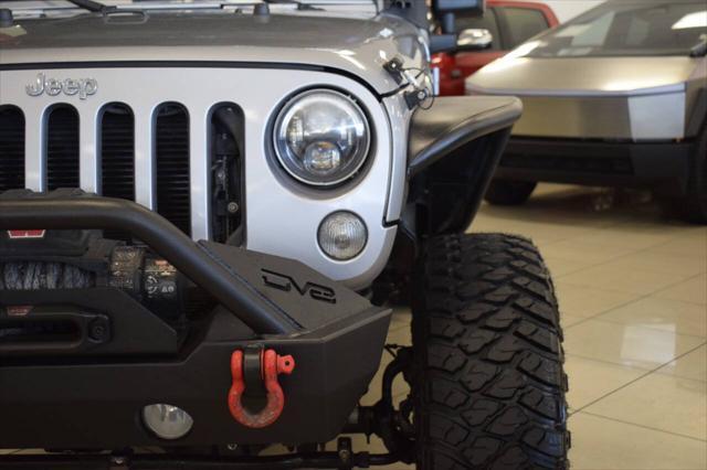 used 2014 Jeep Wrangler Unlimited car, priced at $20,777