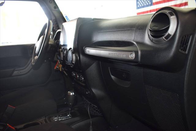 used 2015 Jeep Wrangler Unlimited car, priced at $24,997