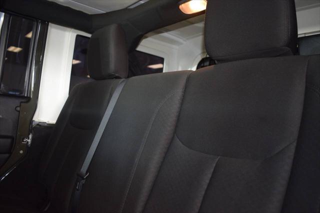 used 2015 Jeep Wrangler Unlimited car, priced at $24,997