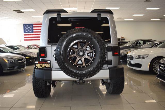 used 2015 Jeep Wrangler Unlimited car, priced at $23,977