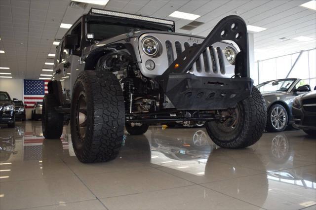 used 2015 Jeep Wrangler Unlimited car, priced at $23,977