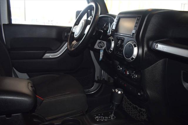 used 2015 Jeep Wrangler Unlimited car, priced at $23,977