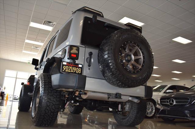 used 2015 Jeep Wrangler Unlimited car, priced at $23,977