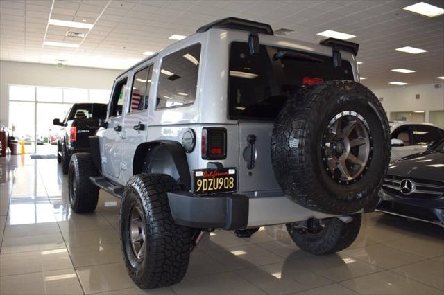 used 2015 Jeep Wrangler Unlimited car, priced at $23,977